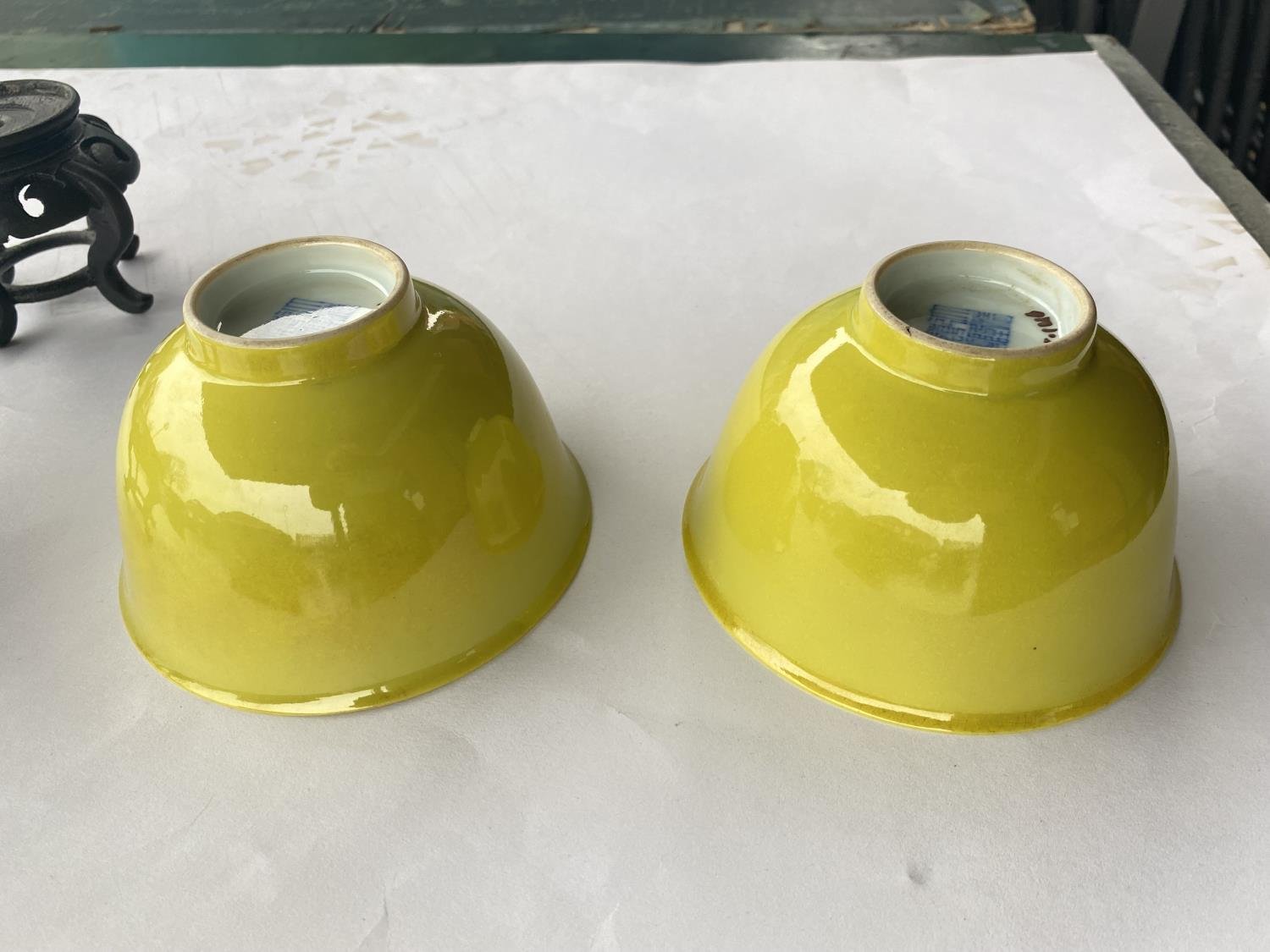 Pair of Chinese imperial yellow rice bowls on hardwood stands — detail 4