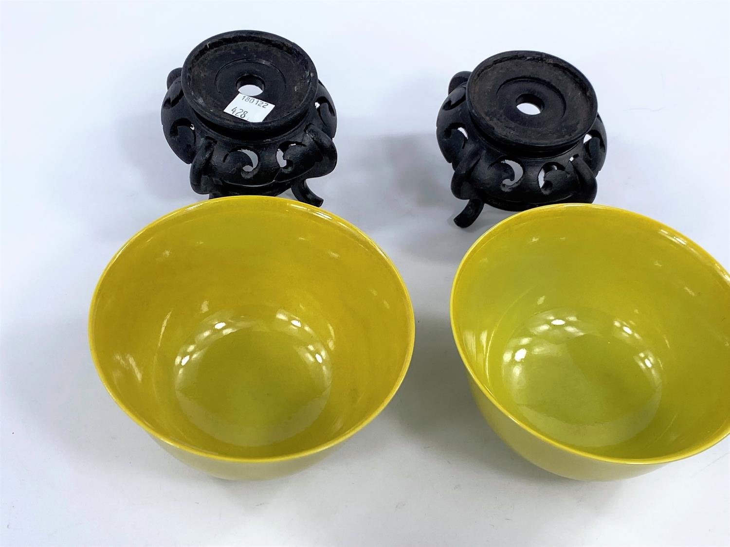 Pair of Chinese imperial yellow rice bowls on hardwood stands — detail 1