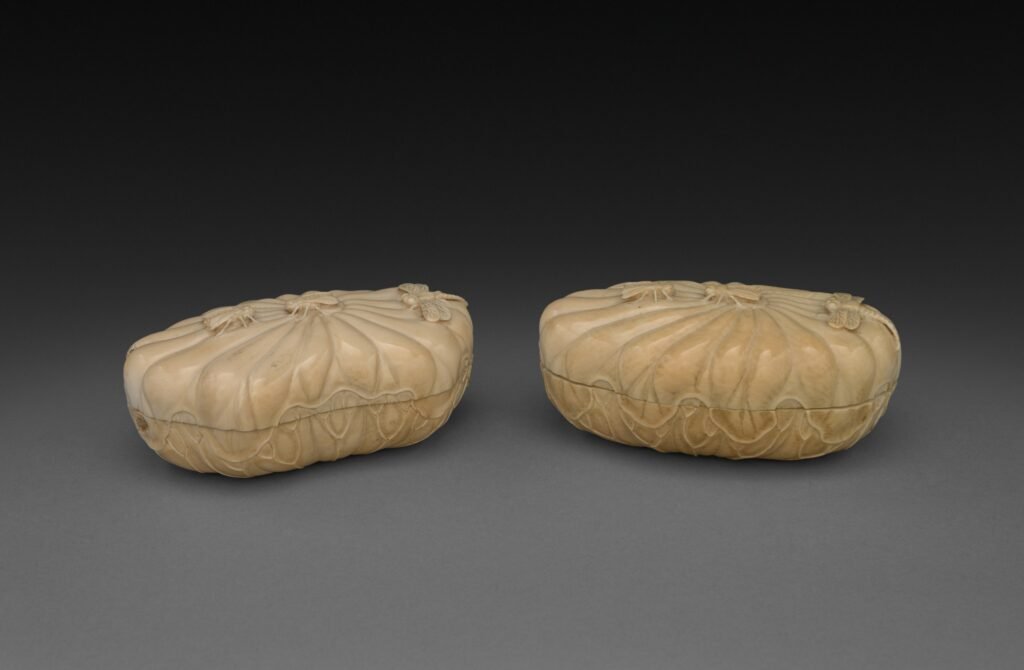 Pair of small carved ivory boxes in the form of lotus leaves, Qing dynasty, seventeen hundreds. Cleveland Museum of Art, 1970.137.