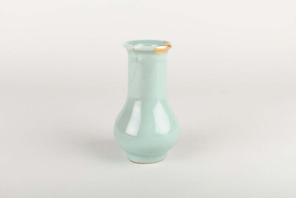 Longquan celadon bottle vase, Southern Song, thirteenth century, with gold lacquer repairs made in Japan. The Metropolitan Museum of Art, accession 34.113.13, Open Access.