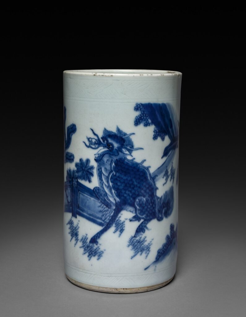 Blue and white porcelain brush holder with a dragon in a landscape, Jingdezhen, Transitional period, Chongzhen reign 1628 to 1644. Cleveland Museum of Art, accession 1940.709, CC0.